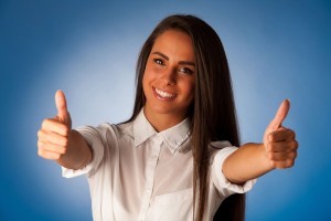 woman giving double thumbs up